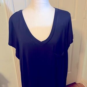Deep navy blue top with front pocket , v neck